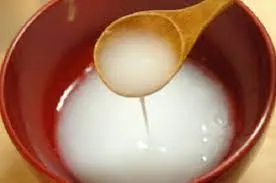 Mestolo e acqua di riso
